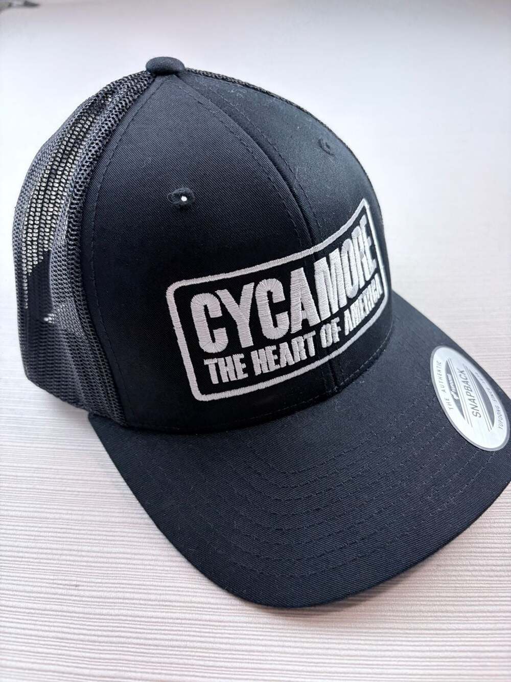 Yupoong Cycamore The Heart Of America Snapback Trucker Hat Black